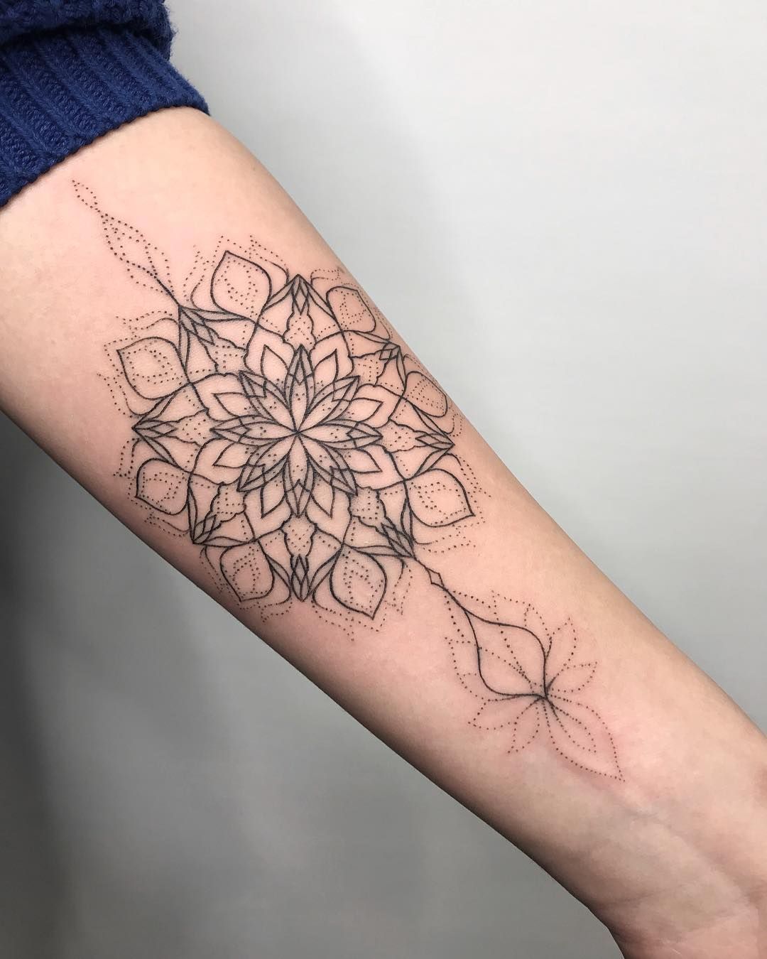 line work mandala tattoo